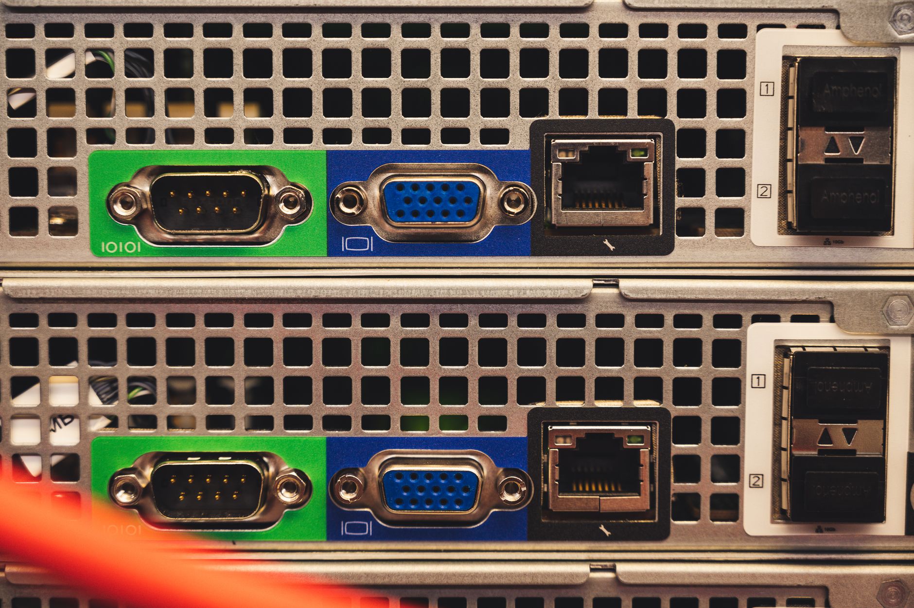 a server room interior with rows of active rack-mounted computing hardware, indicator lights visible, no people